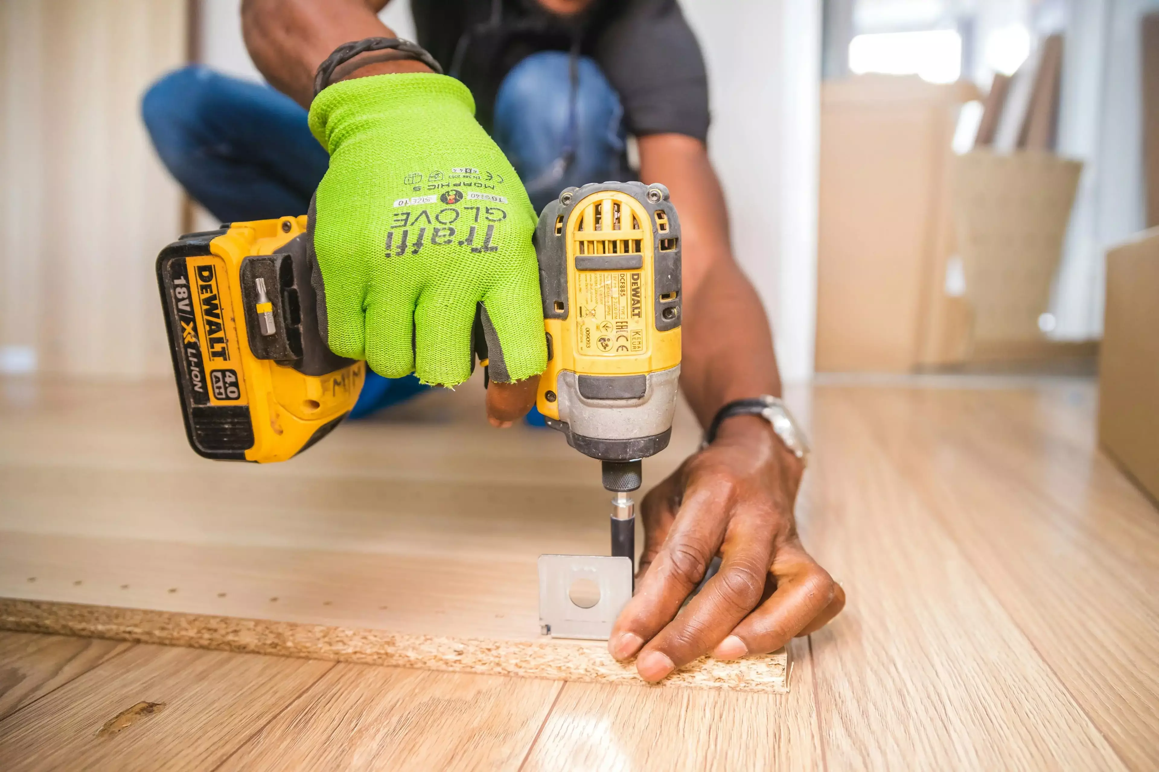 Construction worker working with drill.